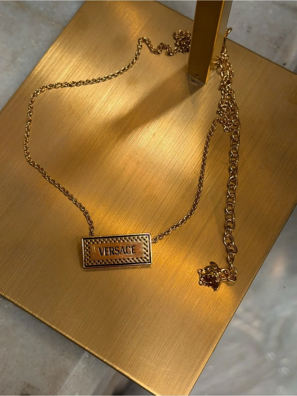Versace Gold Logo Bar Necklace with Pink Floral Accent